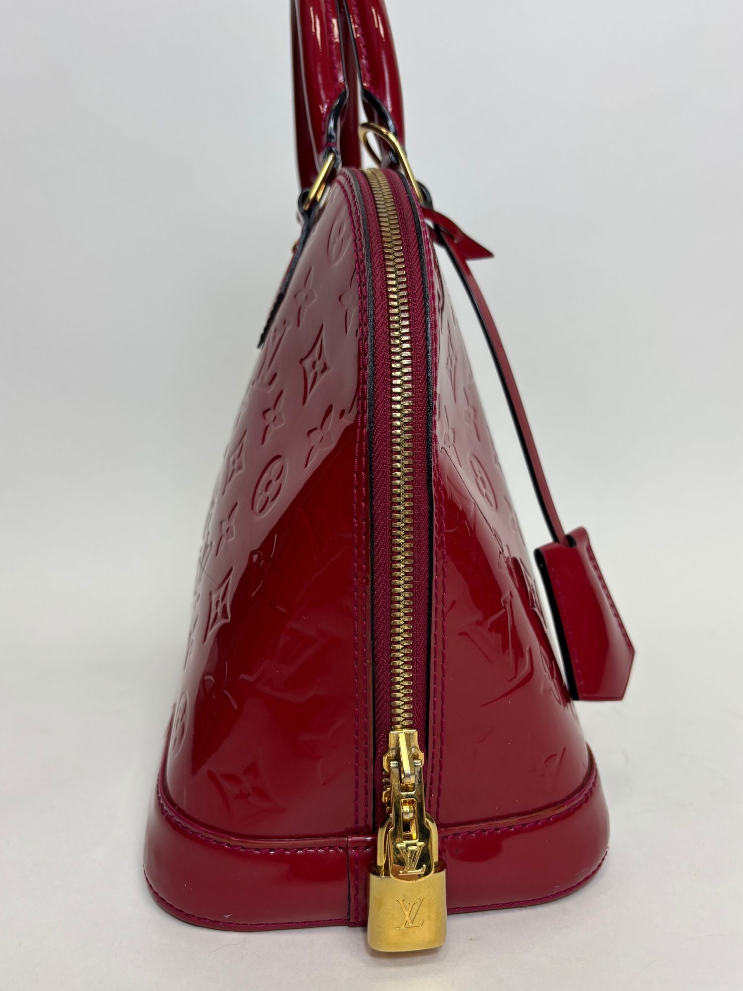 Sac Alma PM Louis Vuitton cuir vernis