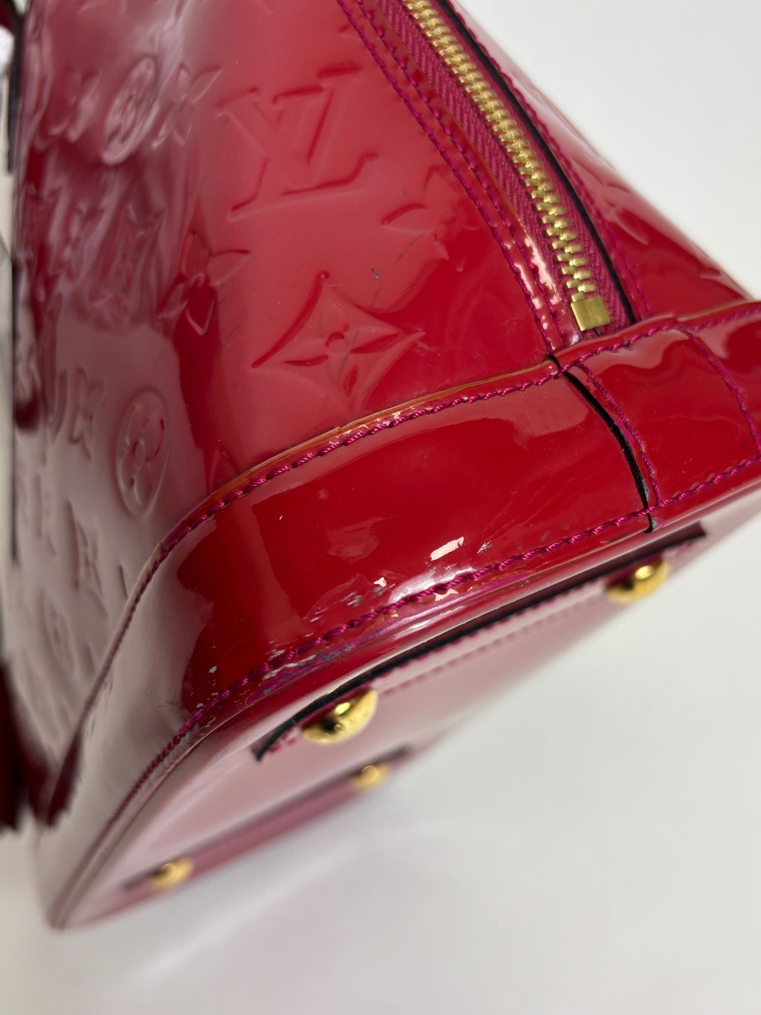Sac Alma PM Louis Vuitton cuir vernis