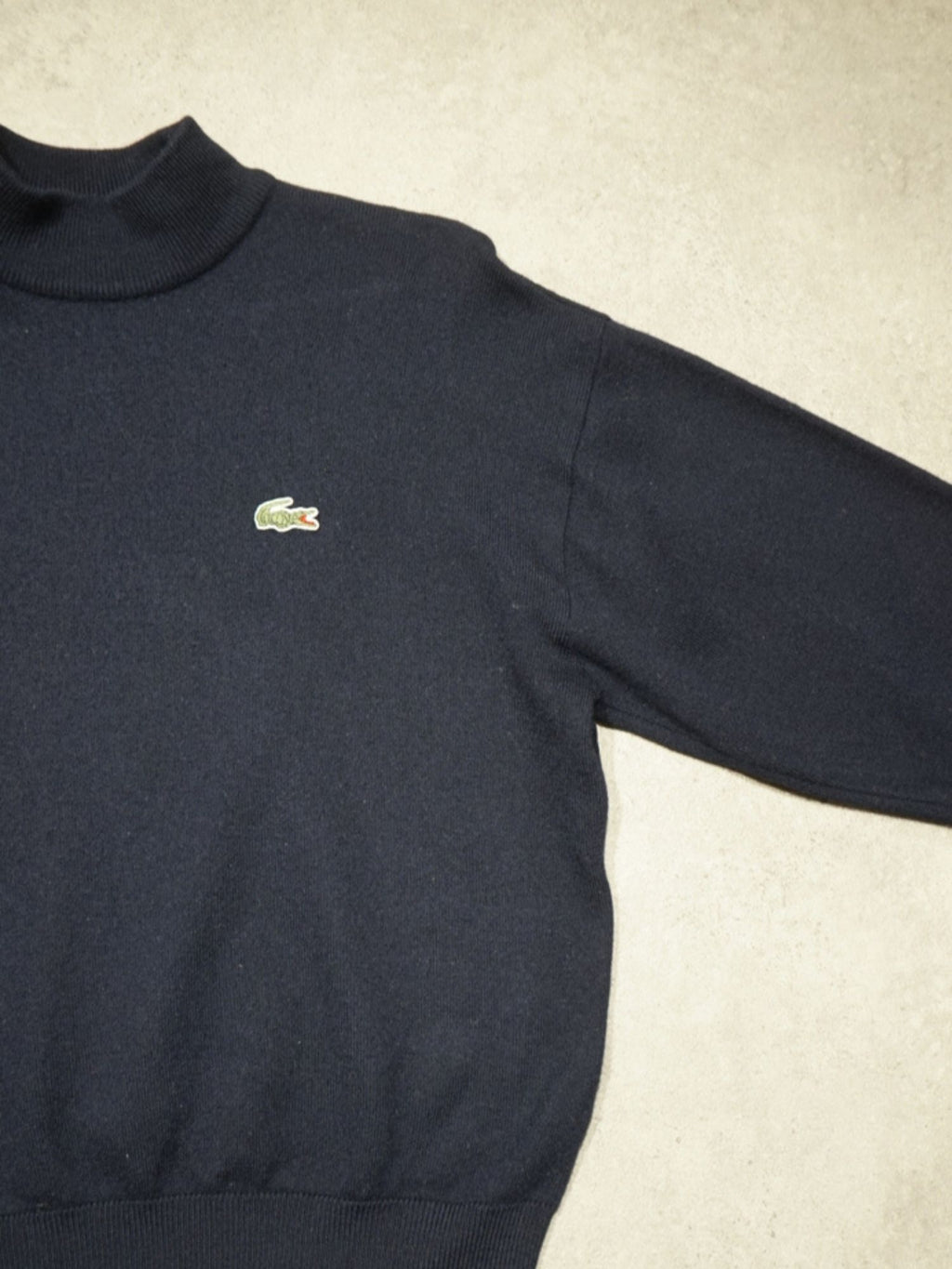 Pull col roulé bleu marine Lacoste (S femme)