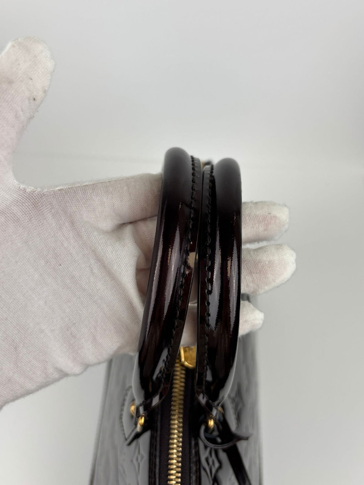 Alma PM cuir vernis Amarante Louis Vuitton