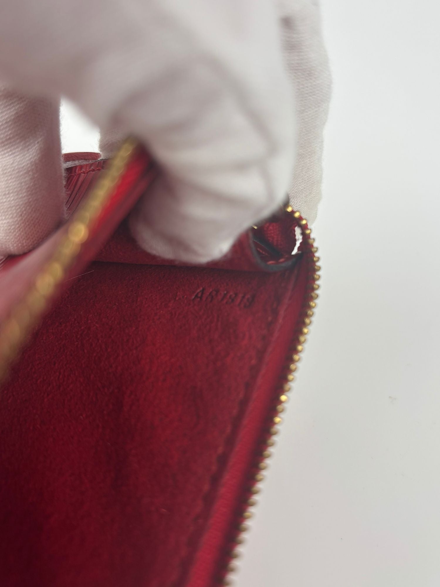 Pochette Louis Vuitton cuir Épi