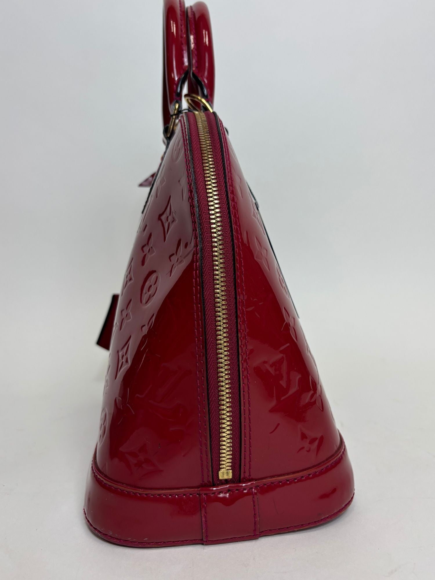 Sac Alma PM Louis Vuitton cuir vernis