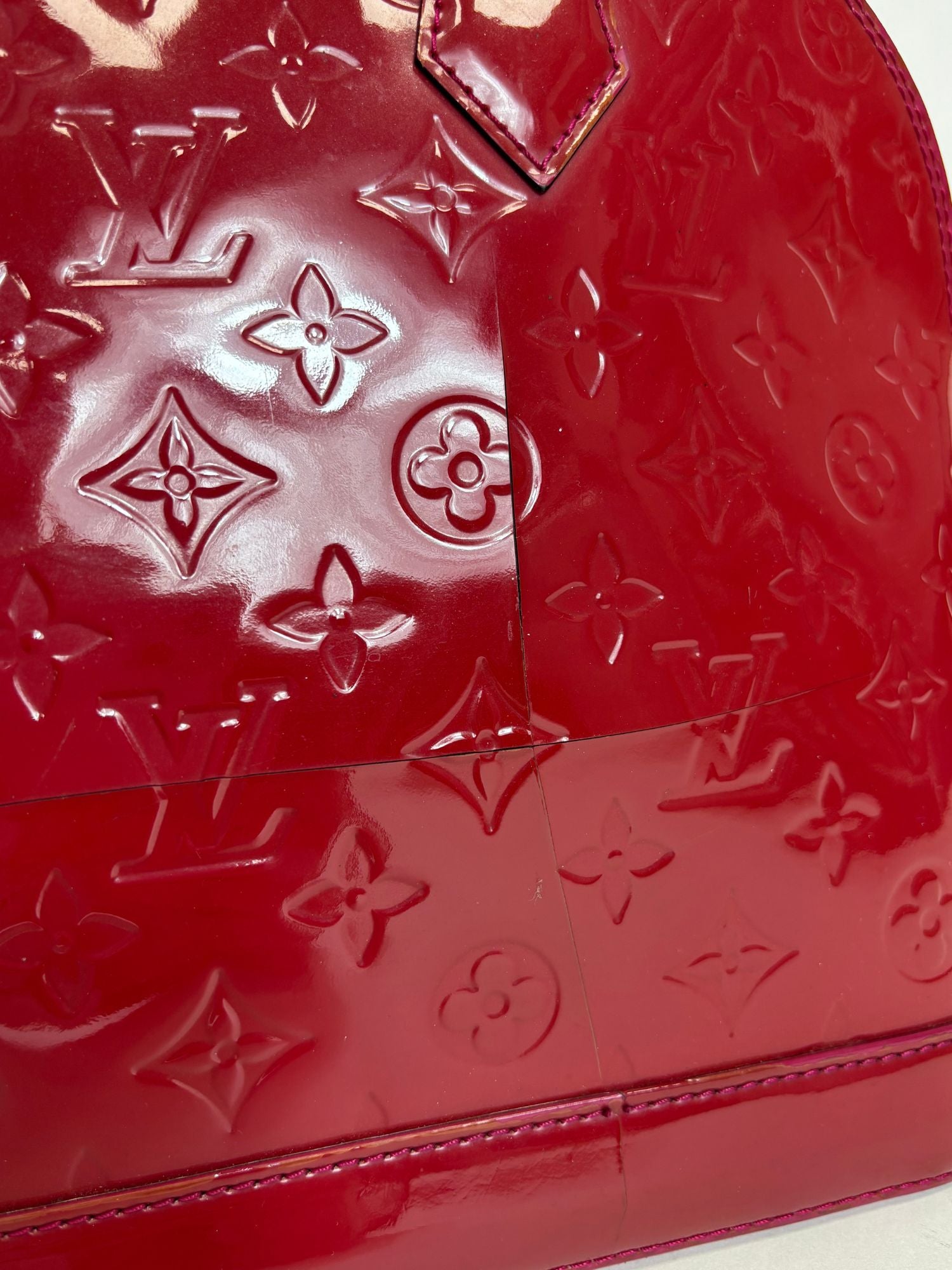 Sac Alma PM Louis Vuitton cuir vernis