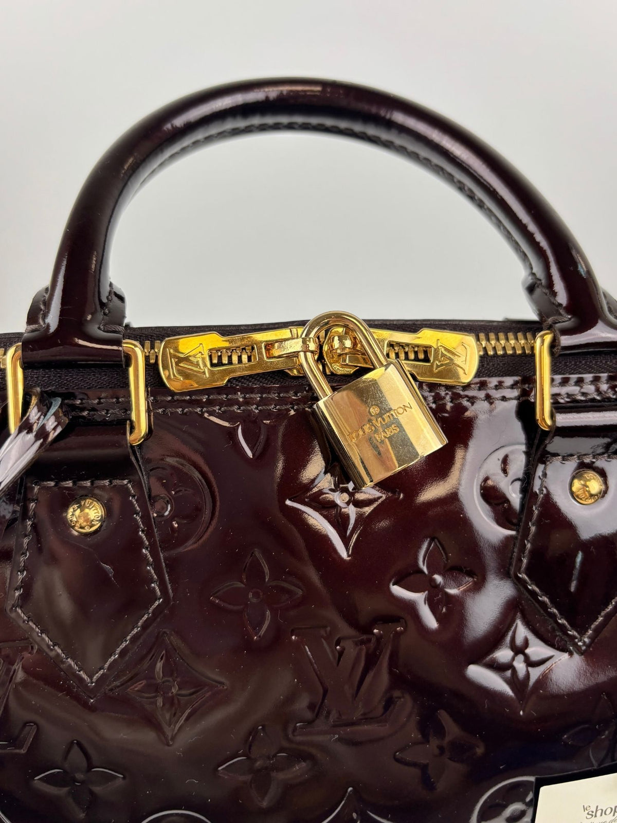 Alma PM cuir vernis Amarante Louis Vuitton
