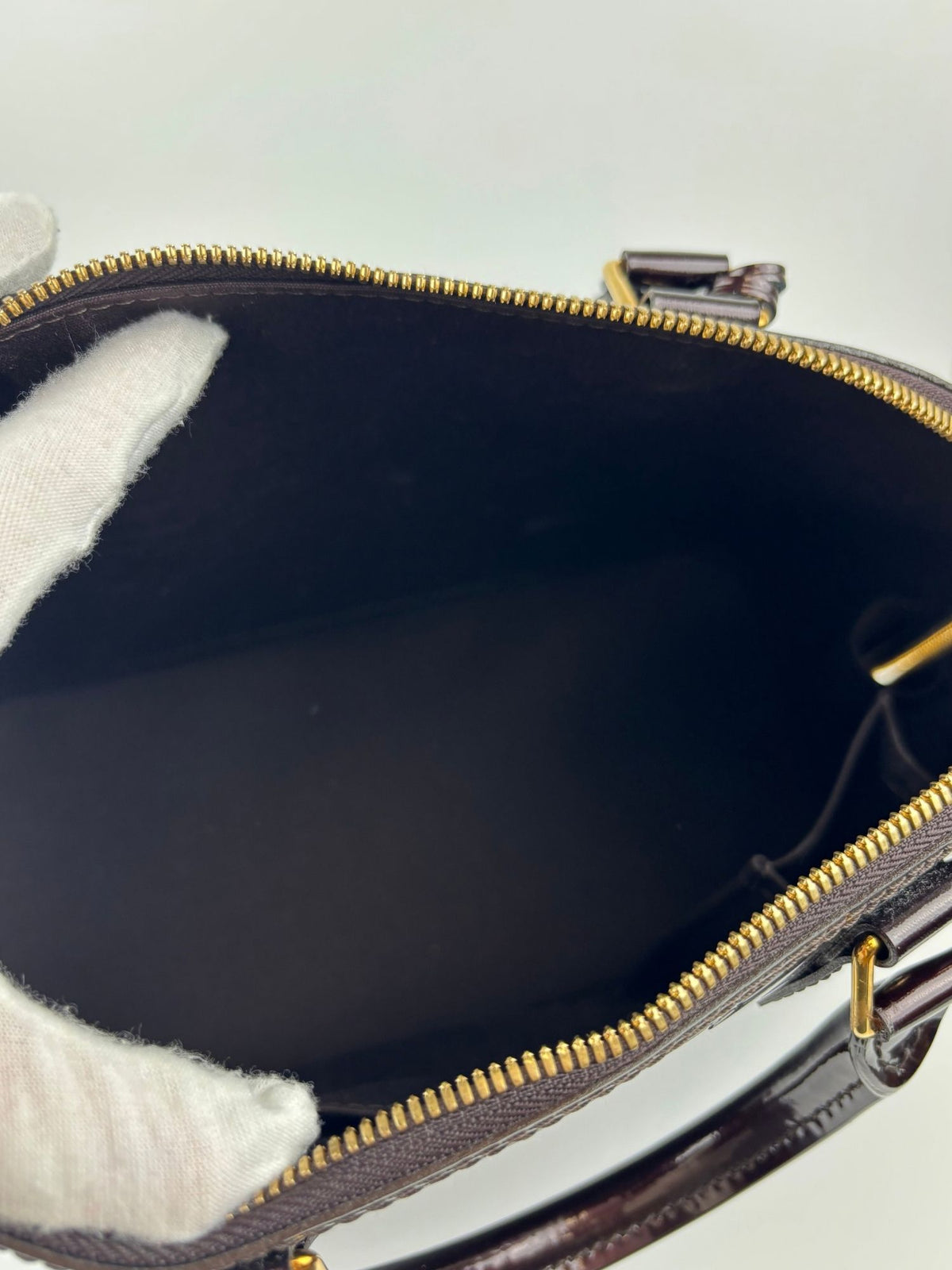 Alma PM cuir vernis Amarante Louis Vuitton
