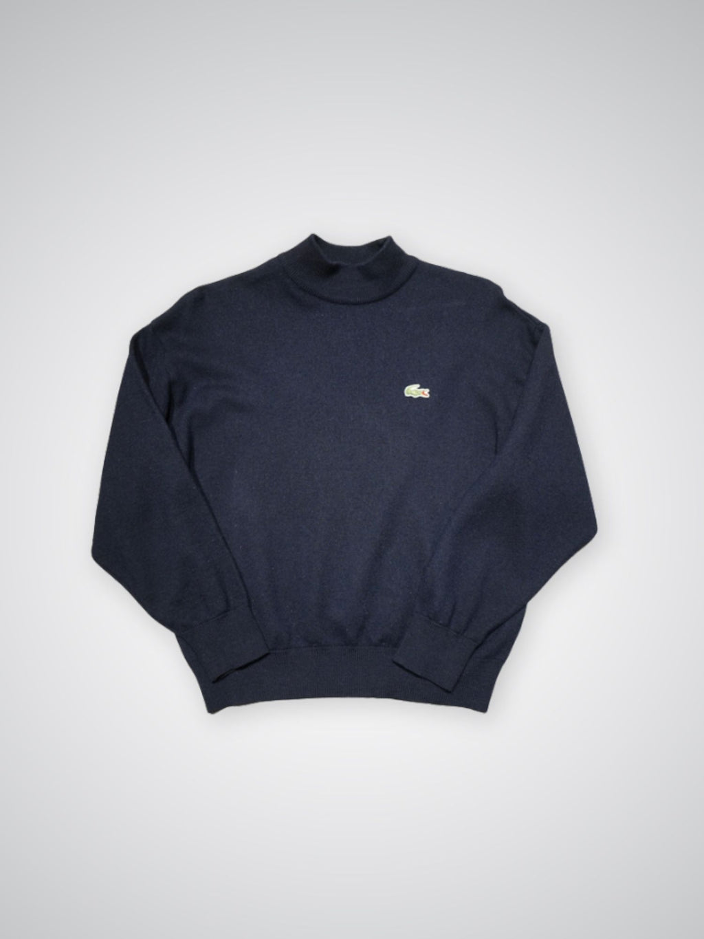 Pull col roulé bleu marine Lacoste (S femme)
