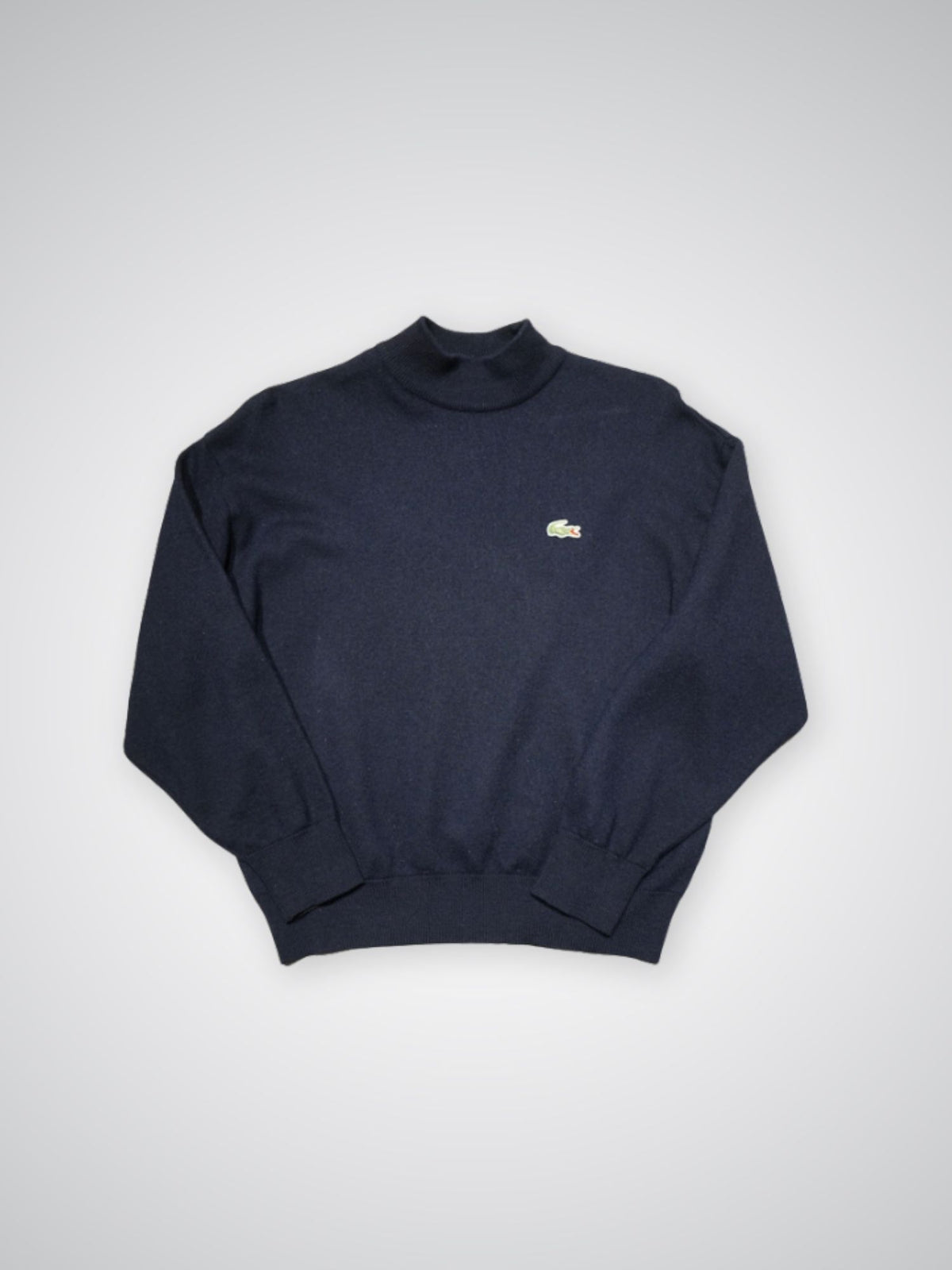 Pull col roulé bleu marine Lacoste (S femme)