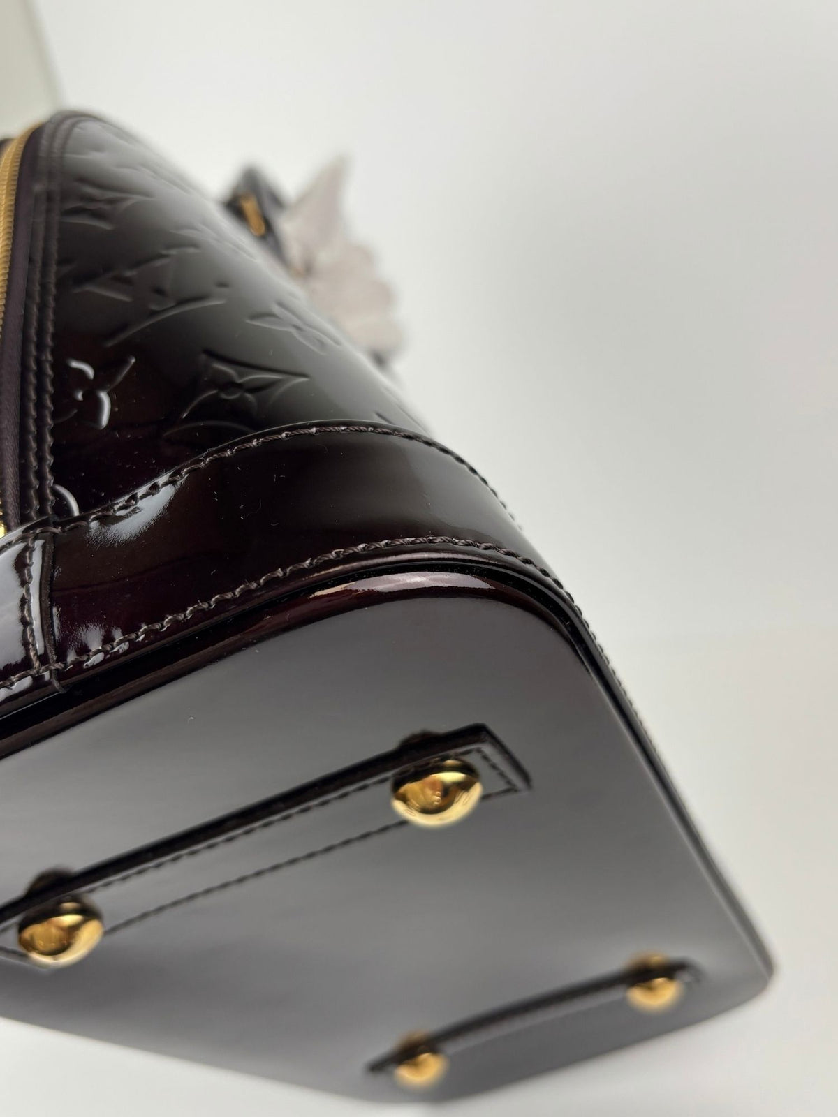 Alma PM cuir vernis Amarante Louis Vuitton