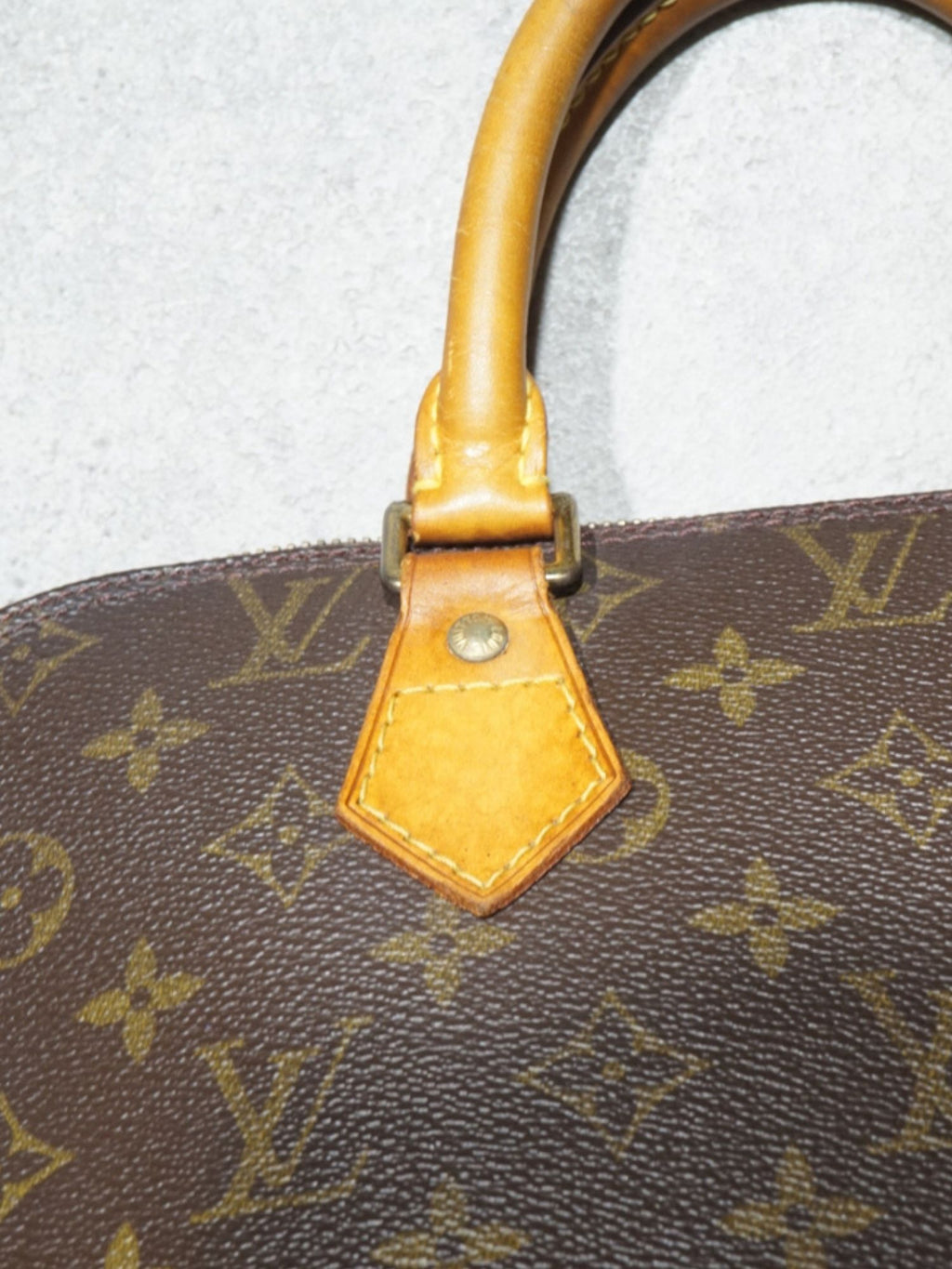 Sac Alma PM monogramme Louis Vuitton